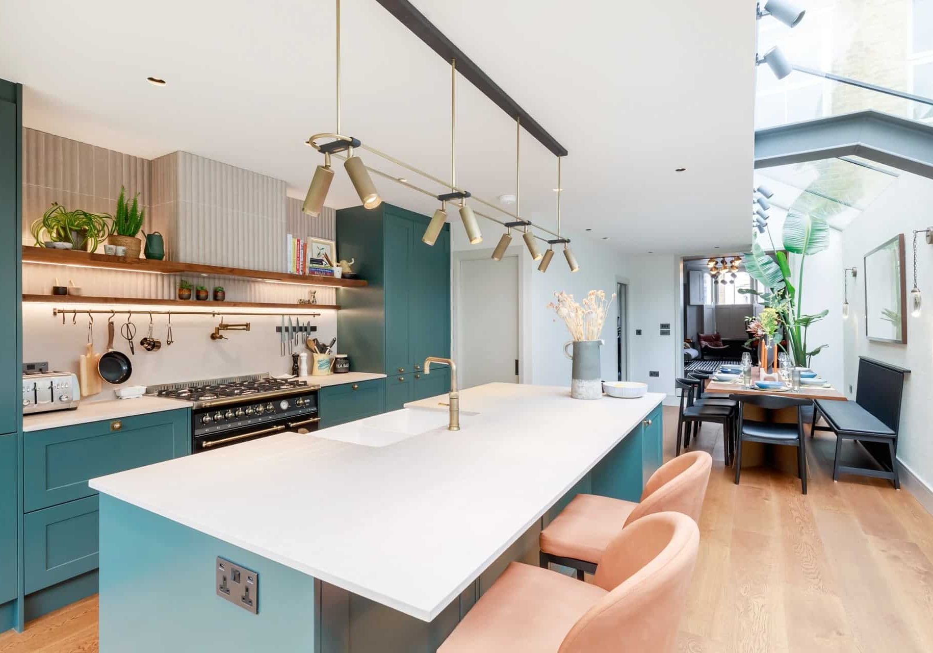 teal green marble island kitchen